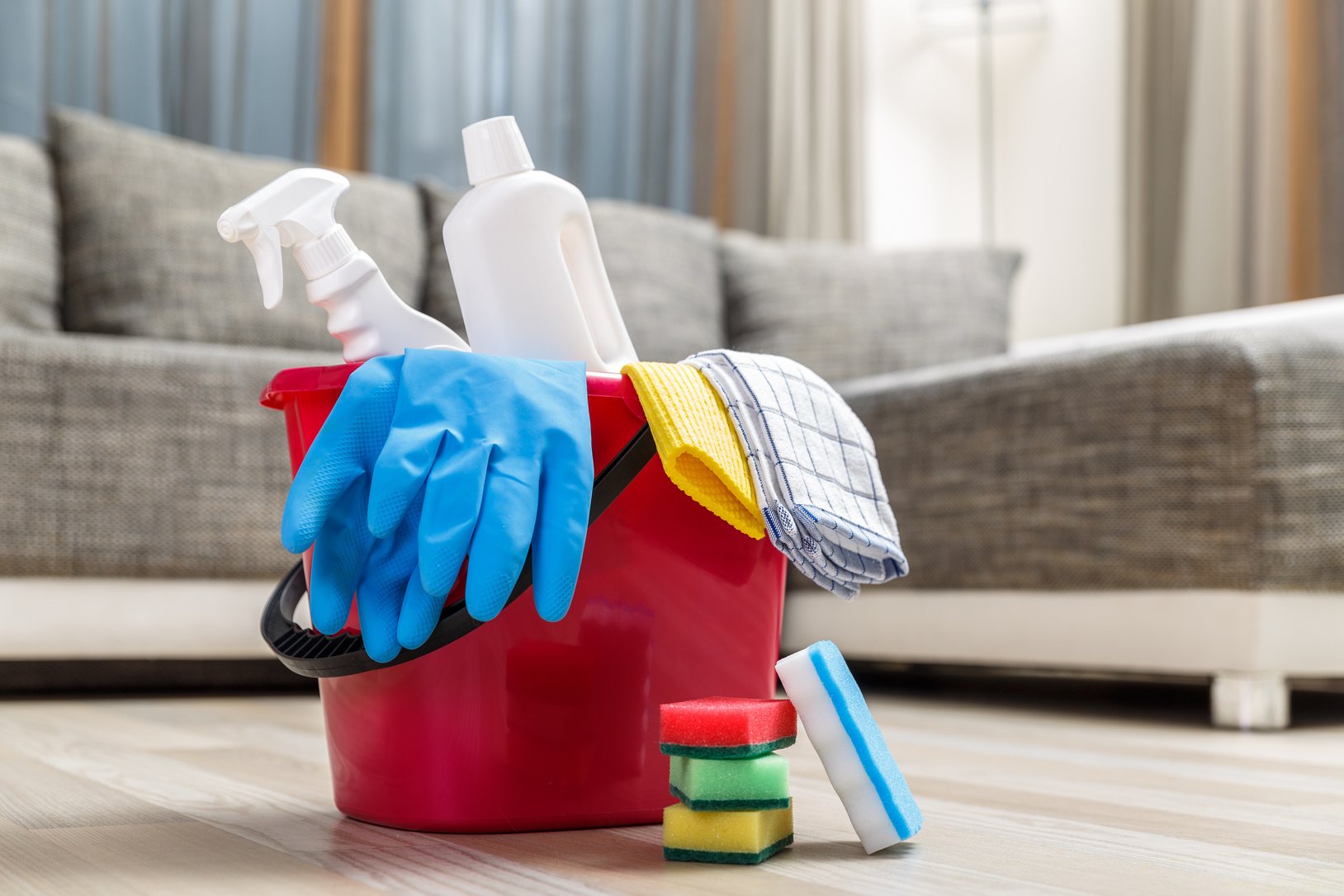 Cleaning service. Bucket with sponges, chemicals.